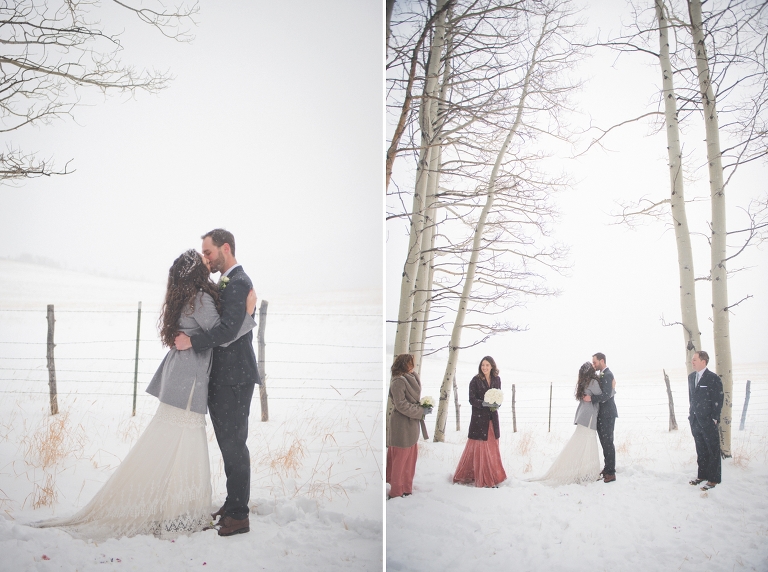 wedding first kiss in the snow